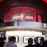 Showgowers visit the Verizon booth on the first day of the Consumer Electronics Show (CES) in Las Vegas January 8, 2013. REUTERS/Rick Wilkin