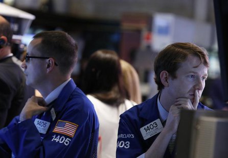 Traders work on the floor at the New York Stock Exchange, June 13, 2013. REUTERS/Brendan McDermid Traders work on the floor at the New York Stock Exchange, June 13, 2013. REUTERS/Brendan McDermid