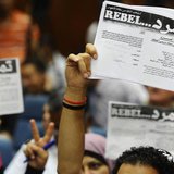 Protesters opposing Egyptian President Mohamed Mursi hold up documents from the "Tamarod" campaign during a news conference at their headqua Protesters opposing Egyptian President Mohamed Mursi hold up documents from the "Tamarod" campaign during a news conference at their headqua