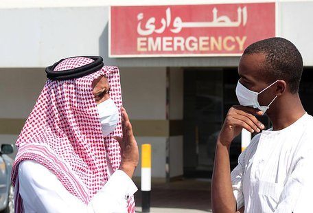 Men wearing surgical masks as a precautionary measure against the novel coronavirus, speak at a hospital in Khobar city in Dammam May 23, 20 Men wearing surgical masks as a precautionary measure against the novel coronavirus, speak at a hospital in Khobar city in Dammam May 23, 20