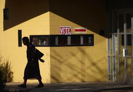 A voter leaves polling station outside Hayden Park during the U.S. presidential election in Phoenix, Arizona November 6, 2012. REUTERS/Joshu A voter leaves polling station outside Hayden Park during the U.S. presidential election in Phoenix, Arizona November 6, 2012. REUTERS/Joshu