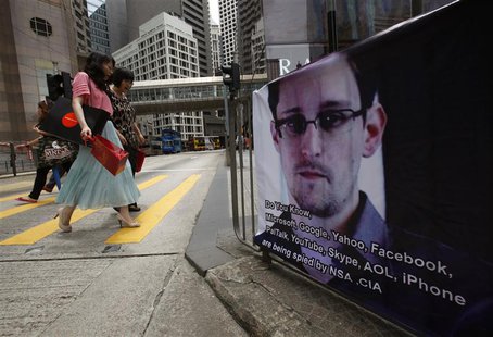 A poster supporting Edward Snowden, a former contractor at the National Security Agency (NSA) who leaked revelations of U.S. electronic surv A poster supporting Edward Snowden, a former contractor at the National Security Agency (NSA) who leaked revelations of U.S. electronic surv