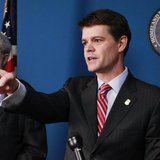 U.S. Immigration and Customs Enforcement Director John Morton (R) answers questions from the media next to U.S. Holocaust Memorial Museum Se U.S. Immigration and Customs Enforcement Director John Morton (R) answers questions from the media next to U.S. Holocaust Memorial Museum Se