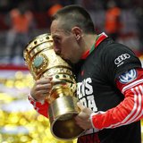 Bayern Munich's Franck Ribery kisses the trophy as he celebrates their victory over VfB Stuttgart in their German soccer cup (DFB Pokal) fin Bayern Munich's Franck Ribery kisses the trophy as he celebrates their victory over VfB Stuttgart in their German soccer cup (DFB Pokal) fin