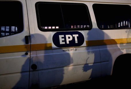 Protesters cast their shadows on a state broadcaster ERT van outside its headquarters in Athens June 16, 2013. REUTERS/Yorgos Karahalis Protesters cast their shadows on a state broadcaster ERT van outside its headquarters in Athens June 16, 2013. REUTERS/Yorgos Karahalis