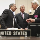 U.S. Secretary of Defense Leon Panetta (L) speaks with U.S. Ambassador to the North Atlantic Treaty Organization Ivo Daalder (C) and Europea