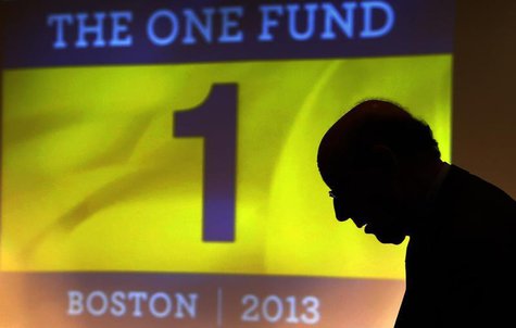 Ken Feinberg, administrator for "The One Fund, Boston" talks to a Boston Marathon bombing survivor before a town hall style meeting about th Ken Feinberg, administrator for "The One Fund, Boston" talks to a Boston Marathon bombing survivor before a town hall style meeting about th