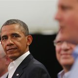 U.S. President Barack Obama glances at Britain's Prime Minister David Cameron (R) during a news conference with European Union officials at U.S. President Barack Obama glances at Britain's Prime Minister David Cameron (R) during a news conference with European Union officials at
