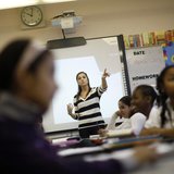 Teacher Jaclyn Kruljac speaks to her students in 5th grade class at Walsh Elementary School in Chicago, Illinois, March 1, 2013. REUTERS/Jim Teacher Jaclyn Kruljac speaks to her students in 5th grade class at Walsh Elementary School in Chicago, Illinois, March 1, 2013. REUTERS/Jim