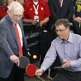 Berkshire Hathaway CEO Warren Buffett (L) plays table tennis with Microsoft Chairman Bill Gates in Omaha May 5, 2013 the day after company's Berkshire Hathaway CEO Warren Buffett (L) plays table tennis with Microsoft Chairman Bill Gates in Omaha May 5, 2013 the day after company's