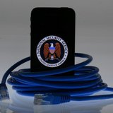 An illustration picture shows the logo of the U.S. National Security Agency on the display of an iPhone in Berlin, June 7, 2013. REUTERS/Paw An illustration picture shows the logo of the U.S. National Security Agency on the display of an iPhone in Berlin, June 7, 2013. REUTERS/Paw