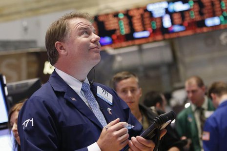 Traders work on the floor at the New York Stock Exchange, June 17, 2013. REUTERS/Brendan McDermid Traders work on the floor at the New York Stock Exchange, June 17, 2013. REUTERS/Brendan McDermid