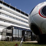 A giant soccer ball is seen in front of the main entrance of the Adidas building in Landersheim near Strasbourg March 31, 2009. REUTERS/Chri A giant soccer ball is seen in front of the main entrance of the Adidas building in Landersheim near Strasbourg March 31, 2009. REUTERS/Chri