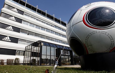 A giant soccer ball is seen in front of the main entrance of the Adidas building in Landersheim near Strasbourg March 31, 2009. REUTERS/Chri A giant soccer ball is seen in front of the main entrance of the Adidas building in Landersheim near Strasbourg March 31, 2009. REUTERS/Chri