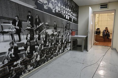 An employee is seen inside a music studio in the Greek state television ERT headquarters at Aghia Paraskevi suburb in Athens June 18, 2013. An employee is seen inside a music studio in the Greek state television ERT headquarters at Aghia Paraskevi suburb in Athens June 18, 2013.