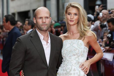 Actor Jason Statham arrives with his girlfriend Rosie Huntington-Whiteley for the world premiere of "Hummingbird", at Leicester Square in ce Actor Jason Statham arrives with his girlfriend Rosie Huntington-Whiteley for the world premiere of "Hummingbird", at Leicester Square in ce