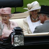 Britain's Queen Elizabeth (L), Prince Charles and Camilla Duchess of Cornwall arrive by carriage for the first day of the Royal Ascot horser