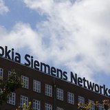 The logo of the telecommunications services company Nokia Siemens Networks is pictured on top their office in Berlin October 9, 2012. REUTER