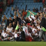 Iran's national soccer team celebrate after defeating South Korea in their World Cup qualifying soccer match in Ulsan, southeast of Seoul Ju