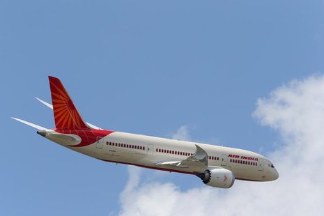 An Air India Airlines Boeing 787 dreamliner takes part in a flying display during the 50th Paris Air Show at the Le Bourget airport near Par An Air India Airlines Boeing 787 dreamliner takes part in a flying display during the 50th Paris Air Show at the Le Bourget airport near Par