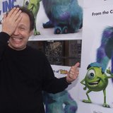 Actor Billy Crystal, voice talent of character Mike Wazowski in the new computer animated film "Monsters,Inc." mimics his characters appeara