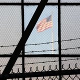 The flag over a war crimes courtroom in Camp Justice at US Naval Base Guantanamo Bay in Cuba in this photo reviewed by the U.S. Department o