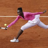 Venus Williams of the U.S. hits a return to Urszula Radwanska of Poland during their women's singles match at the French Open tennis tournam Venus Williams of the U.S. hits a return to Urszula Radwanska of Poland during their women's singles match at the French Open tennis tournam