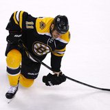 Boston Bruins' Gregory Campbell grimaces after being injured during second period play against the Pittsburgh Penguins in Game 3 of their NH Boston Bruins' Gregory Campbell grimaces after being injured during second period play against the Pittsburgh Penguins in Game 3 of their NH