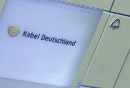 The logo of Germany's biggest cable operator, Kabel Deutschland, is written on a door bell at the Kabel Deutschland playout center in Frankf The logo of Germany's biggest cable operator, Kabel Deutschland, is written on a door bell at the Kabel Deutschland playout center in Frankf
