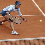 Li Na of China hits a return to Bethanie Mattek-Sands of the U.S. during their women's singles match at the French Open tennis tournament at Li Na of China hits a return to Bethanie Mattek-Sands of the U.S. during their women's singles match at the French Open tennis tournament at