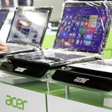 Acer laptops are displayed in a computer mall in Taipei March 19, 2013. REUTERS/Pichi Chuang
