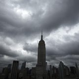 Storm clouds pass over the top of the Empire State Building in New York, June 13, 2013. REUTERS/Lucas Jackson Storm clouds pass over the top of the Empire State Building in New York, June 13, 2013. REUTERS/Lucas Jackson