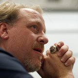 Former MLB player Curt Schilling talks with a reporter at the Electronic Entertainment Expo, or E3, in Los Angeles, California June 9, 2011. Former MLB player Curt Schilling talks with a reporter at the Electronic Entertainment Expo, or E3, in Los Angeles, California June 9, 2011.