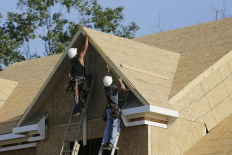Carpenter's work on installing fascia trimwork at a housing site at Mid-Atlantic Builders "The Villages of Savannah" development in Brandywi Carpenter's work on installing fascia trimwork at a housing site at Mid-Atlantic Builders "The Villages of Savannah" development in Brandywi