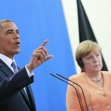 U.S. President Barack Obama speaks next to German Chancellor Angela Merkel (R) during a news conference after their meeting at the Chancelle U.S. President Barack Obama speaks next to German Chancellor Angela Merkel (R) during a news conference after their meeting at the Chancelle