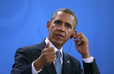 U.S. President Barack Obama addresses a news conference after a bilateral meeting with German Chancellor Angela Merkel at the Chancellery in U.S. President Barack Obama addresses a news conference after a bilateral meeting with German Chancellor Angela Merkel at the Chancellery in