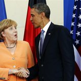 U.S. President Barack Obama and German Chancellor Angela Merkel shake hands at the end of a joint news conference at the Chancellery in Berl U.S. President Barack Obama and German Chancellor Angela Merkel shake hands at the end of a joint news conference at the Chancellery in Berl
