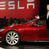 Tesla Motors CEO Elon Musk speaks next to the company's newest Model S during the Model S Beta Event held at the Tesla factory in Fremont, C Tesla Motors CEO Elon Musk speaks next to the company's newest Model S during the Model S Beta Event held at the Tesla factory in Fremont, C