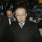 North Korea's First Vice Foreign Minister and envoy to the six-party talks Kim Kye-gwan (2nd L) enters a hotel after a meeting with U.S. Spe North Korea's First Vice Foreign Minister and envoy to the six-party talks Kim Kye-gwan (2nd L) enters a hotel after a meeting with U.S. Spe