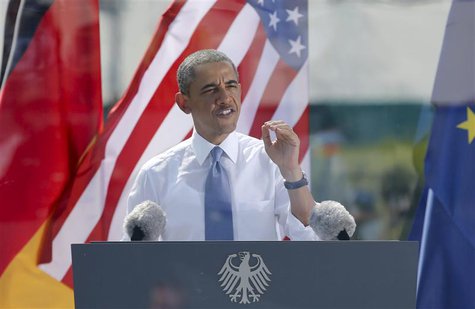 U.S. President Barack Obama speaks from behind a bulletproof glass at the Brandenburg Gate in Berlin, June 19, 2013. REUTERS/Fabrizio Bensch U.S. President Barack Obama speaks from behind a bulletproof glass at the Brandenburg Gate in Berlin, June 19, 2013. REUTERS/Fabrizio Bensch