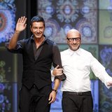 Italian designers Domenico Dolce (R) and Stefano Gabbana acknowledge the applause at the end of D&G Spring/Summer 2012 women's collection sh Italian designers Domenico Dolce (R) and Stefano Gabbana acknowledge the applause at the end of D&G Spring/Summer 2012 women's collection sh