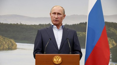Russia's President Vladimir Putin gestures during a media conference after a G8 summit at the Lough Erne golf resort in Enniskillen, Norther Russia's President Vladimir Putin gestures during a media conference after a G8 summit at the Lough Erne golf resort in Enniskillen, Norther