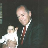 James "Whitey" Bulger holds John Martorano's youngest son, John Jr., during his Christening ceremony in this undated handout photo provided 