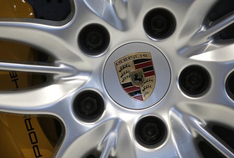 A logo is seen on a wheel of a Porsche 911 Carrera 4S ahead of the annual news conference at the Porsche headquarters in Stuttgart March 15, A logo is seen on a wheel of a Porsche 911 Carrera 4S ahead of the annual news conference at the Porsche headquarters in Stuttgart March 15,
