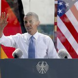 U.S. President Barack Obama speaks from behind a bulletproof glass at the Brandenburg Gate in Berlin, June 19, 2013. REUTERS/Fabrizio Bensch