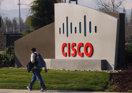 A pedestrian walks past the Cisco logo at the technology company's campus in San Jose, California February 3, 2010. REUTERS/Robert Galbraith A pedestrian walks past the Cisco logo at the technology company's campus in San Jose, California February 3, 2010. REUTERS/Robert Galbraith