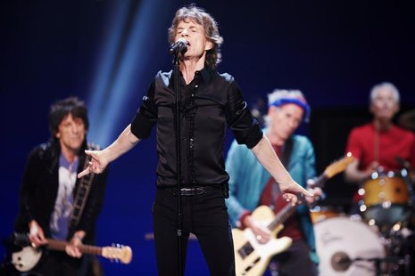 Mick Jagger (2nd L) performs with Ronnie Wood (rear L-R), Keith Richards and Charlie Watts of the Rolling Stones at a concert during the ban Mick Jagger (2nd L) performs with Ronnie Wood (rear L-R), Keith Richards and Charlie Watts of the Rolling Stones at a concert during the ban