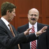 Defense Attorney Mark O'Mara (L) and prosecutor Bernie de la Rionda talk as jury selection continues in George Zimmerman's second-degree mur Defense Attorney Mark O'Mara (L) and prosecutor Bernie de la Rionda talk as jury selection continues in George Zimmerman's second-degree mur