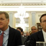 U.S. Airways Chairman and CEO Doug Parker (L) and American Airlines General Counsel Gary Kennedy (R) testify before the U.S. Senate Commerce