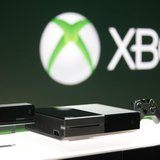 Xbox One (C) with the Kinect motions sensor (L) and the controller is pictured during a press event unveiling Microsoft's new Xbox in Redmon